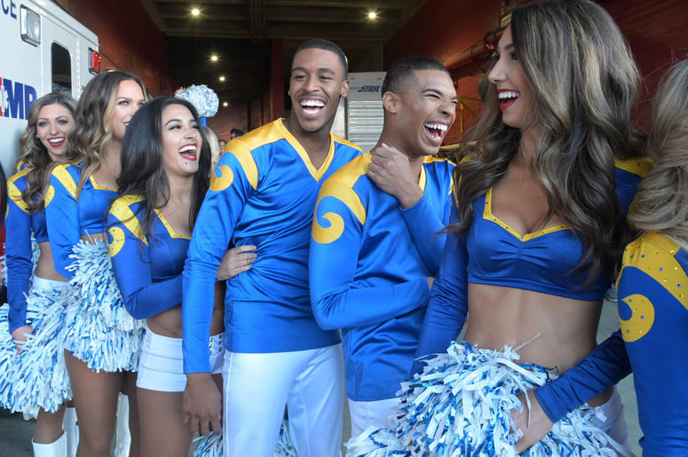 os Angeles Rams male cheerleaders Quinton Peron and Napolean Jnnies reat during the game against the San Francisco 49ers at Los Angeles Memorial Coliseum. os Angeles Rams male cheerleaders Quinton Peron and Napolean Jnnies reat during the game against the San Francisco 49ers at Los Angeles Memorial Coliseum.