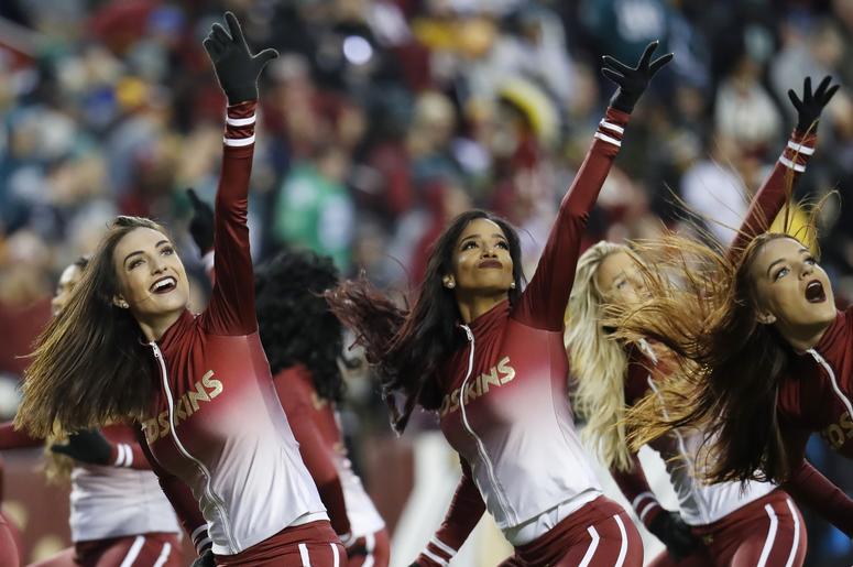 Washington Redskins cheerleaders dance on the field during a timeout against the Philadelphia Eagles in the second quarter at FedEx Field. The Eagles won 24-0. Washington Redskins cheerleaders dance on the field during a timeout against the Philadelphia Eagles in the second quarter at FedEx Field. The Eagles won 24-0.