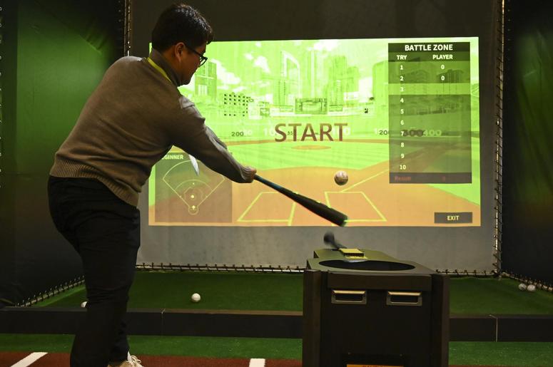 January 8, 2019; Las Vegas, NV, USA; Seungwon Choi takes a swing Auto Bat's \"Perfection\" a batting training and analysis product during the Consumer Electronics Show 2019 at the Sands Expo Convention Center. January 8, 2019; Las Vegas, NV, USA; Seungwon Choi takes a swing Auto Bat's \"Perfection\" a batting training and analysis product during the Consumer Electronics Show 2019 at the Sands Expo Convention Center.
