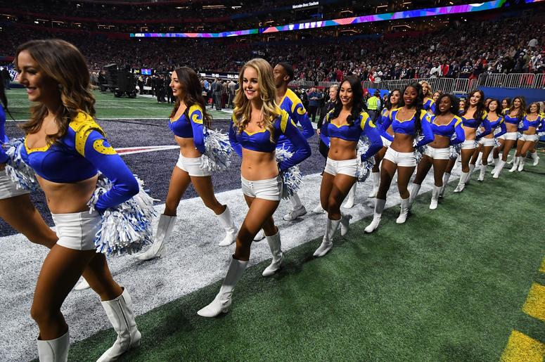 Los Angeles Rams cheerleaders walk onto the field before Super Bowl LIII against the New England Patriots at Mercedes-Benz Stadium. Los Angeles Rams cheerleaders walk onto the field before Super Bowl LIII against the New England Patriots at Mercedes-Benz Stadium.