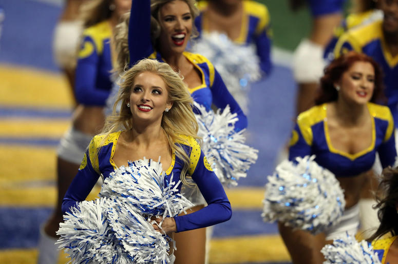 os Angeles Rams cheerleaders run off the field during the third quarter against the New England Patriots in Super Bowl LIII at Mercedes-Benz Stadium. os Angeles Rams cheerleaders run off the field during the third quarter against the New England Patriots in Super Bowl LIII at Mercedes-Benz Stadium.