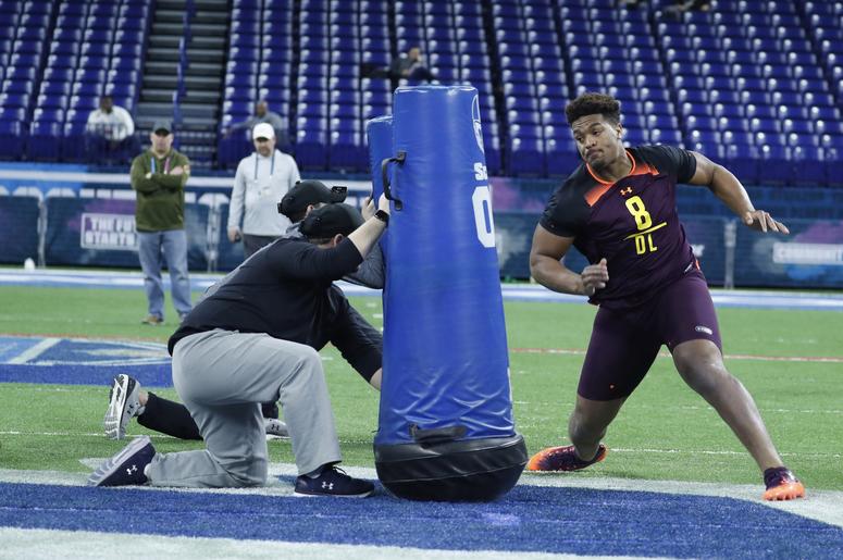 Ohio State defensive lineman Dre'Mont Jones (DL08) goes through workout drills during the 2019 NFL Combine at Lucas Oil Stadium. Ohio State defensive lineman Dre'Mont Jones (DL08) goes through workout drills during the 2019 NFL Combine at Lucas Oil Stadium.