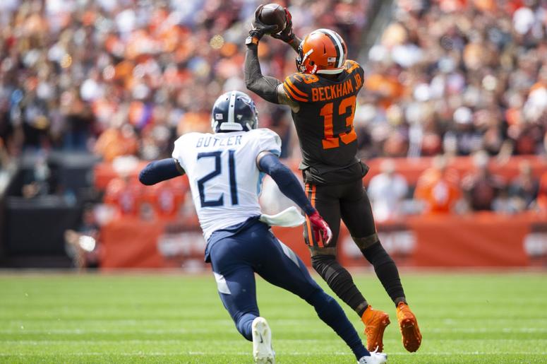 leveland Browns wide receiver Odell Beckham (13) makes a catch under coverage by Tennessee Titans cornerback Malcolm Butler (21) during the first quarter at FirstEnergy Stadium. leveland Browns wide receiver Odell Beckham (13) makes a catch under coverage by Tennessee Titans cornerback Malcolm Butler (21) during the first quarter at FirstEnergy Stadium.