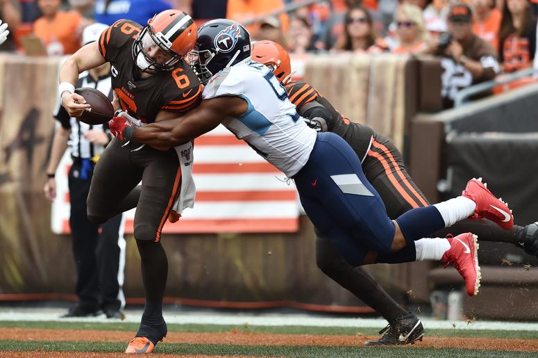 Tennessee Titans linebacker Cameron Wake (91) sacks Cleveland Browns quarterback Baker Mayfield (6) in the end zone for a safety during the first half at FirstEnergy Stadium. Tennessee Titans linebacker Cameron Wake (91) sacks Cleveland Browns quarterback Baker Mayfield (6) in the end zone for a safety during the first half at FirstEnergy Stadium.