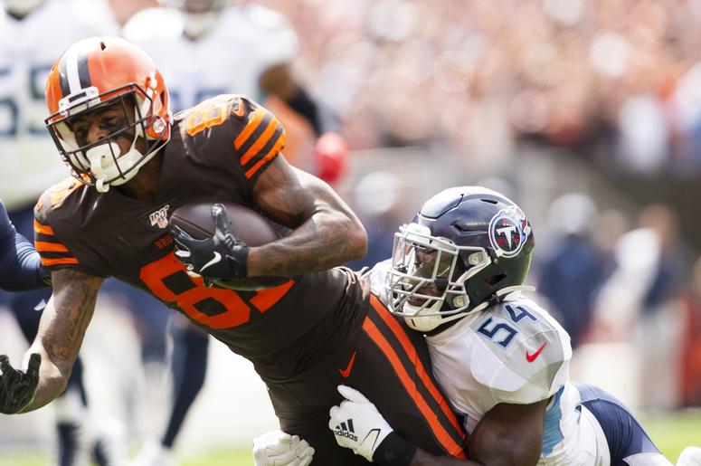 Cleveland Browns wide receiver Rashard Higgins (81) runs the ball as Tennessee Titans inside linebacker Rashaan Evans (54) tackles him from behind during the first quarter at FirstEnergy Stadium. Cleveland Browns wide receiver Rashard Higgins (81) runs the ball as Tennessee Titans inside linebacker Rashaan Evans (54) tackles him from behind during the first quarter at FirstEnergy Stadium.
