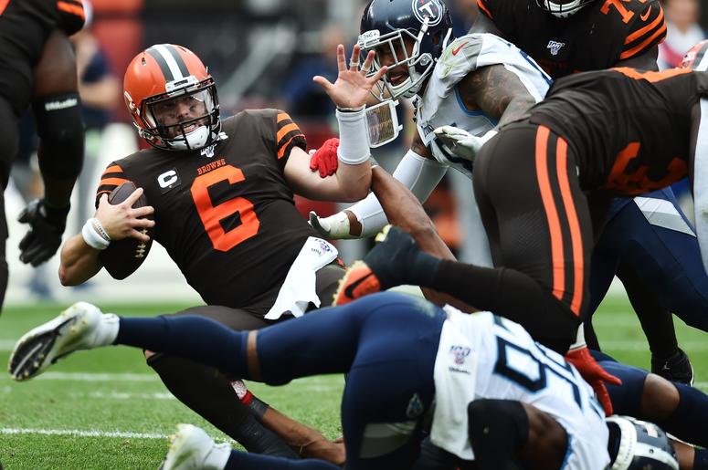 Cleveland Browns quarterback Baker Mayfield (6) is sacked by Tennessee Titans linebacker Cameron Wake (91) during the second half at FirstEnergy Stadium. Cleveland Browns quarterback Baker Mayfield (6) is sacked by Tennessee Titans linebacker Cameron Wake (91) during the second half at FirstEnergy Stadium.