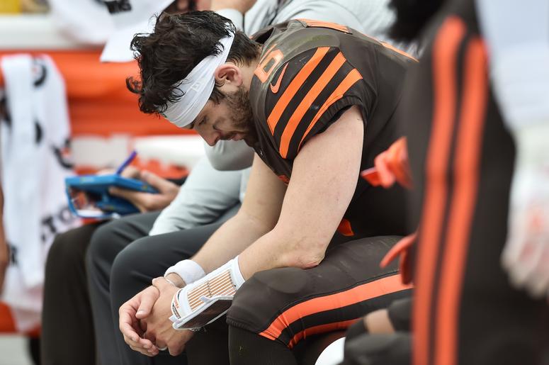 leveland Browns quarterback Baker Mayfield (6) bows his head on the bench during the first half against the Tennessee Titans at FirstEnergy Stadium. leveland Browns quarterback Baker Mayfield (6) bows his head on the bench during the first half against the Tennessee Titans at FirstEnergy Stadium.
