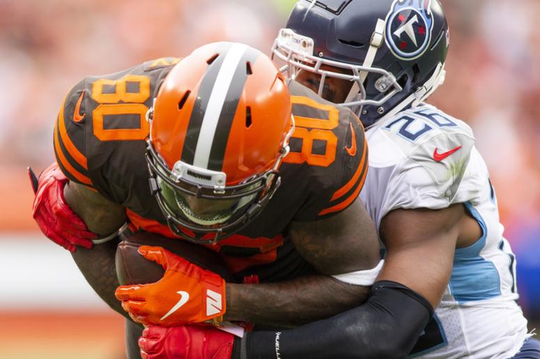 Cleveland Browns wide receiver Jarvis Landry (80) makes a catch for a first down against Tennessee Titans cornerback Logan Ryan (26) during the third quarter at FirstEnergy Stadium. Cleveland Browns wide receiver Jarvis Landry (80) makes a catch for a first down against Tennessee Titans cornerback Logan Ryan (26) during the third quarter at FirstEnergy Stadium.