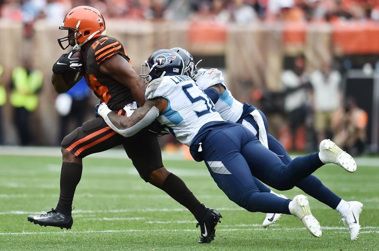 Tennessee Titans linebacker Harold Landry (58) and free safety Kevin Byard (31) chase down Cleveland Browns running back Nick Chubb (24) during the second half at FirstEnergy Stadium. Tennessee Titans linebacker Harold Landry (58) and free safety Kevin Byard (31) chase down Cleveland Browns running back Nick Chubb (24) during the second half at FirstEnergy Stadium.