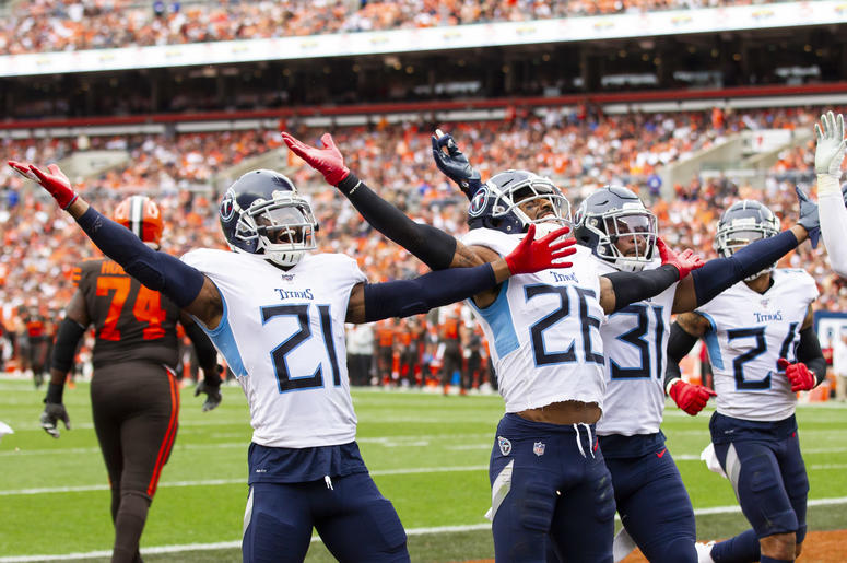 Sep 8, 2019; Cleveland, OH, USA; Tennessee Titans cornerback Logan Ryan (26) celebrates his interception with cornerback Malcolm Butler (21) and Tennessee Titans free safety Kevin Byard (31) against the Cleveland Browns during the fourth quarter at FirstE
