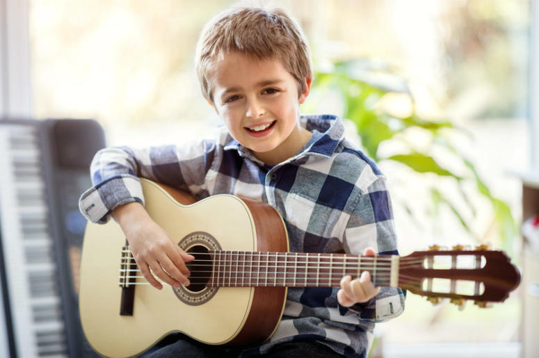 Boy playing guitar Boy playing guitar