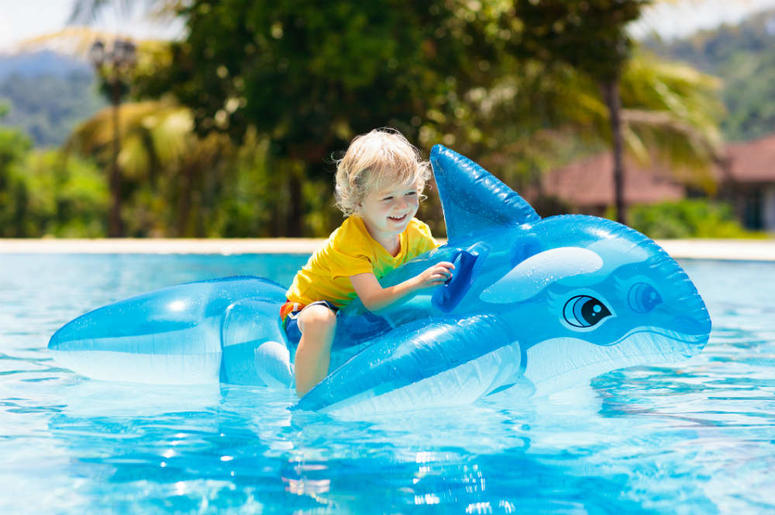 kid on shark pool toy Kid on shark pool toy