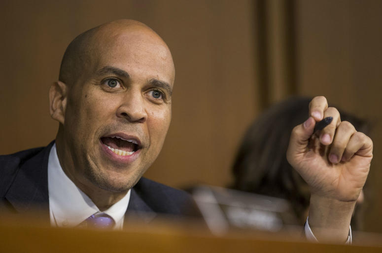 Corey Booker introduced new bill to the senate looking into reparations. Corey Booker introduced new bill to the senate looking into reparations.