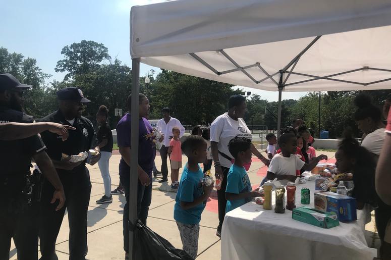 National Night Out emphasized collaboration between police and the community. National Night Out emphasized collaboration between police and the community.