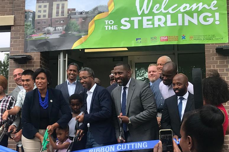 Mayor Muriel Bowser cut the ribbon on a brand new short-term family living facility. Mayor Muriel Bowser cut the ribbon on a brand new short-term family living facility.