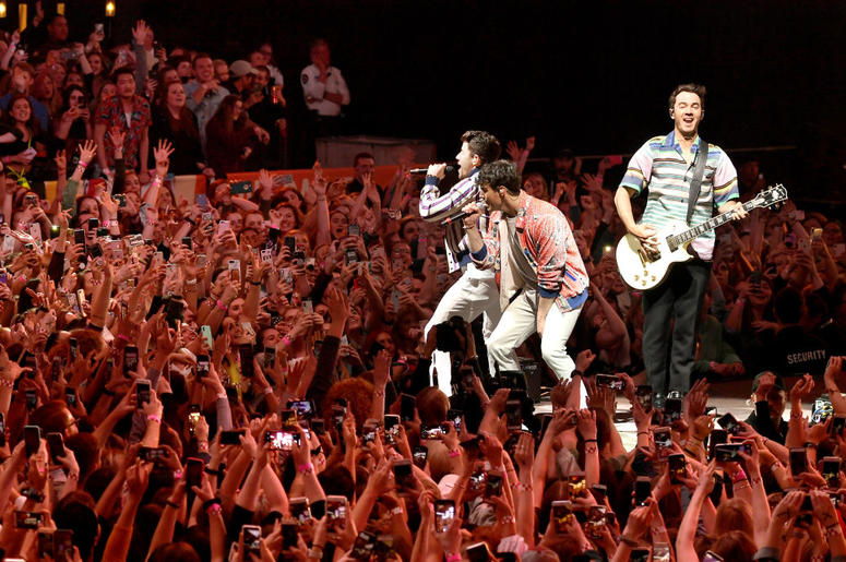 Nick Jonas, Joe Jonas, and Kevin Jonas of the Jonas Brothers perform onstage at the March Madness Music Series featuring Jonas Brothers presented by Coca-Cola during the NCAA March Madness Music Series at The Armory on April 06, 2019 in Minneapolis, MN Nick Jonas, Joe Jonas, and Kevin Jonas of the Jonas Brothers perform onstage at the March Madness Music Series featuring Jonas Brothers presented by Coca-Cola during the NCAA March Madness Music Series at The Armory on April 06, 2019 in Minneapolis, MN