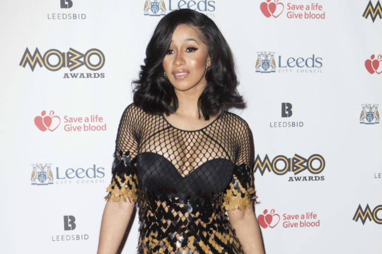 Cardi B 4/26/2018 - File photo dated 29/11/17 of Cardi B, who has reassured fans she will still be working her "ass off" despite cancelling a number of live shows due to her pregnancy.
