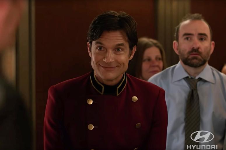 This undated image provided by Hyundai shows a scene from the company's 2019 Super Bowl NFL football spot starring Jason Bateman. As for celebrities, always a staple in Super Bowl ads, Jason Bateman appears as an affable elevator operator to showcase Hyun This undated image provided by Hyundai shows a scene from the company's 2019 Super Bowl NFL football spot starring Jason Bateman. As for celebrities, always a staple in Super Bowl ads, Jason Bateman appears as an affable elevator operator to showcase Hyun