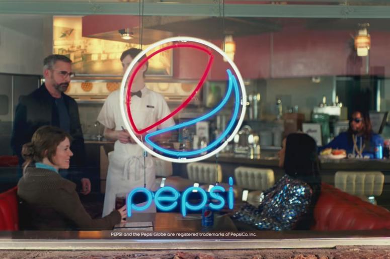 This screen grab from video provided by PepsiCo shows an image from the company's 2019 Super Bowl NFL football spot featuring Steve Carell, Cardi B and Lil Jon. Star power abounds in this year’s Super Bowl ads. (PepsiCo via AP) This screen grab from video provided by PepsiCo shows an image from the company's 2019 Super Bowl NFL football spot featuring Steve Carell, Cardi B and Lil Jon. Star power abounds in this year’s Super Bowl ads. (PepsiCo via AP)
