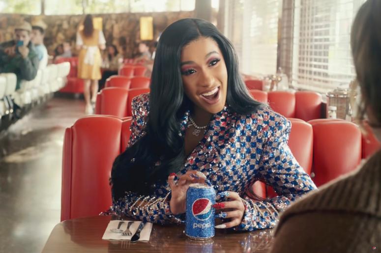 This screen grab from video provided by PepsiCo shows an image from the company's 2019 Super Bowl NFL football spot featuring Cardi B. Star power abounds in this year’s Super Bowl ads. (PepsiCo via AP) This screen grab from video provided by PepsiCo shows an image from the company's 2019 Super Bowl NFL football spot featuring Cardi B. Star power abounds in this year’s Super Bowl ads. (PepsiCo via AP)