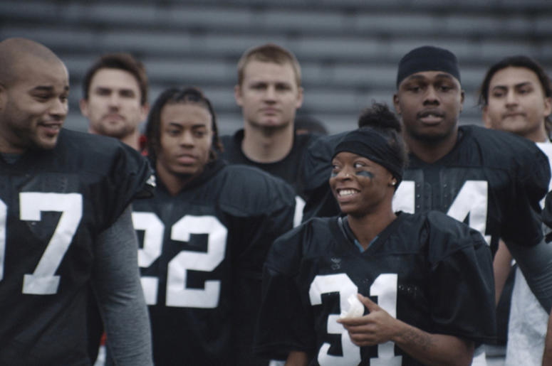 This undated image provided by Toyota Motor North America shows a scene from the company's 2019 Super Bowl NFL football spot starring Antoinette “Toni” Harris, a female football player at a California community college. (Toyota Motor North America via AP) This undated image provided by Toyota Motor North America shows a scene from the company's 2019 Super Bowl NFL football spot starring Antoinette “Toni” Harris, a female football player at a California community college. (Toyota Motor North America via AP)