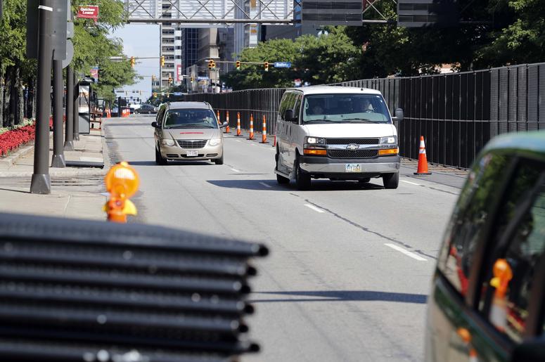 July 15, 2016; Cleveland, OH, USA; Cars pass through a corridor of security fencing assembled on the streets in preparation for the 2016 Republican National Convention held at the Quicken Loans Arena. Mandatory Credit: Andrew P. Scott-USA TODAY NETWORK July 15, 2016; Cleveland, OH, USA; Cars pass through a corridor of security fencing assembled on the streets in preparation for the 2016 Republican National Convention held at the Quicken Loans Arena. Mandatory Credit: Andrew P. Scott-USA TODAY NETWORK
