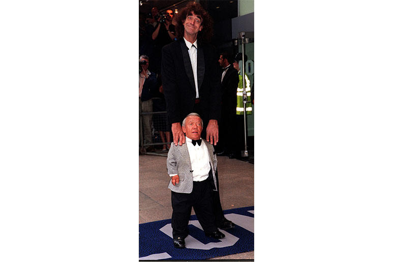7/14/1999 - File photo dated 14/07/99 Peter Mayhew, who played Chewbacca and Kenny Baker who palyed R2D2 arriving for the Royal Film Performance of Star Wars : Episode 1 The Phantom Menace at the Odeon Leicester Square in London, as Mr Baker has died at t 7/14/1999 - File photo dated 14/07/99 Peter Mayhew, who played Chewbacca and Kenny Baker who palyed R2D2 arriving for the Royal Film Performance of Star Wars : Episode 1 The Phantom Menace at the Odeon Leicester Square in London, as Mr Baker has died at t