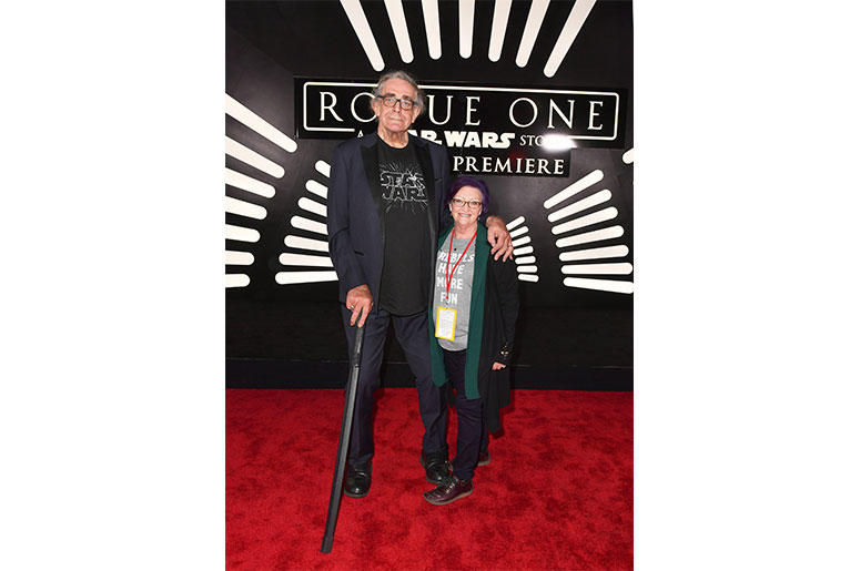 HOLLYWOOD, CA - DECEMBER 10: Actor Peter Mayhew (L) and Angie Mayhew attend The World Premiere of Lucasfilm's highly anticipated, first-ever, standalone Star Wars adventure, "Rogue One: A Star Wars Story" at the Pantages Theatre on December 10, 2016 in Ho HOLLYWOOD, CA - DECEMBER 10: Actor Peter Mayhew (L) and Angie Mayhew attend The World Premiere of Lucasfilm's highly anticipated, first-ever, standalone Star Wars adventure, "Rogue One: A Star Wars Story" at the Pantages Theatre on December 10, 2016 in Ho
