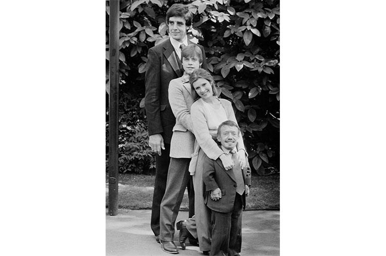 Actor Peter Mayhew, Mark Hamill, Carrie Fisher (1956 - 2016), Kenny Baker (1934 - 2016), co-stars in the first Star Wars trilogy, UK, 20th May 1980. (Photo by Chris Ball/Evening Standard/Hulton Archive/Getty Images) Actor Peter Mayhew, Mark Hamill, Carrie Fisher (1956 - 2016), Kenny Baker (1934 - 2016), co-stars in the first Star Wars trilogy, UK, 20th May 1980. (Photo by Chris Ball/Evening Standard/Hulton Archive/Getty Images)