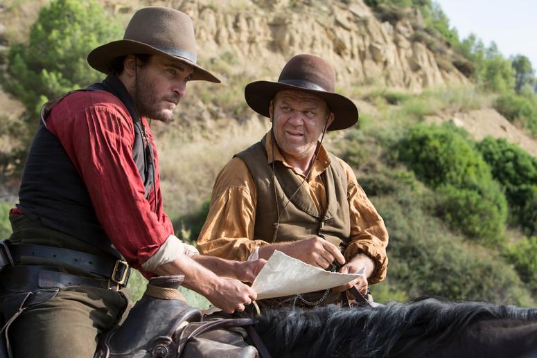 Joaquin Phoenix (left) stars as “Charlie Sisters” and John C. Reilly (right) stars as “Eli Sisters” in Jacques Audiard’s THE SISTERS BROTHERS, an Annapurna Pictures release. Joaquin Phoenix (left) stars as “Charlie Sisters” and John C. Reilly (right) stars as “Eli Sisters” in Jacques Audiard’s THE SISTERS BROTHERS, an Annapurna Pictures release.