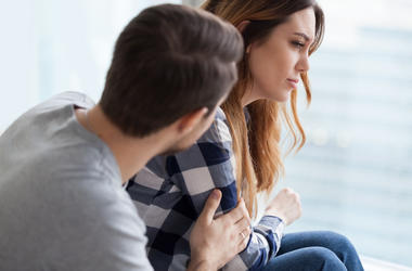 Man Comforts Woman