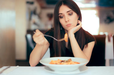 Woman Eating Alone woman eating alone