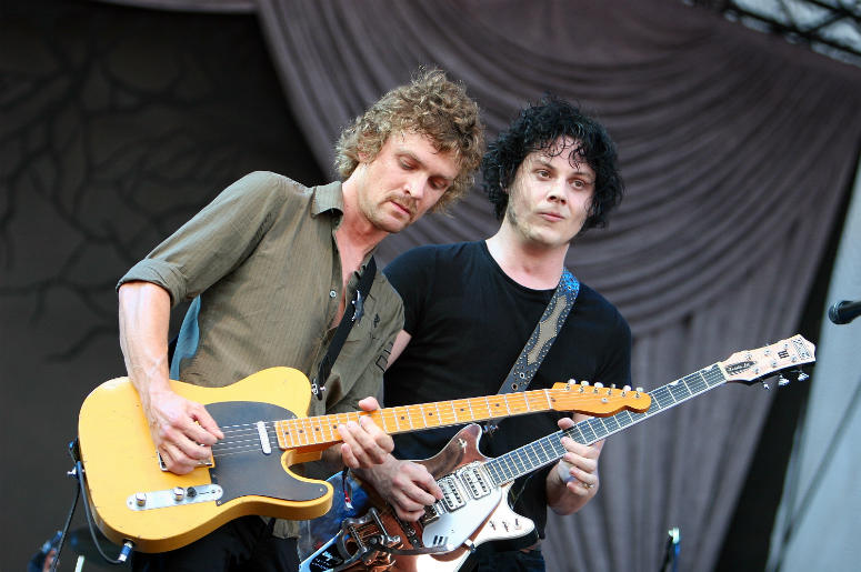 Singer/guitarist Brendan Benson (L) and singer/guitarist Jack White of The Raconteurs perform onstage at the 2008 Lollapalooza Singer/guitarist Brendan Benson (L) and singer/guitarist Jack White of The Raconteurs perform onstage at the 2008 Lollapalooza