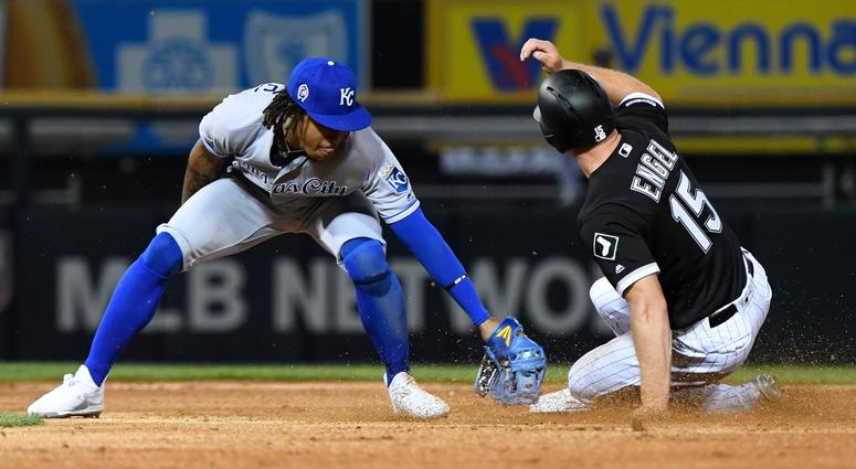 White Sox outfielder Adam Engel (15) steals second base ahead of a tag by Royals shortstop Adalberto Mondesi (27). White Sox outfielder Adam Engel (15) steals second base ahead of a tag by Royals shortstop Adalberto Mondesi (27).