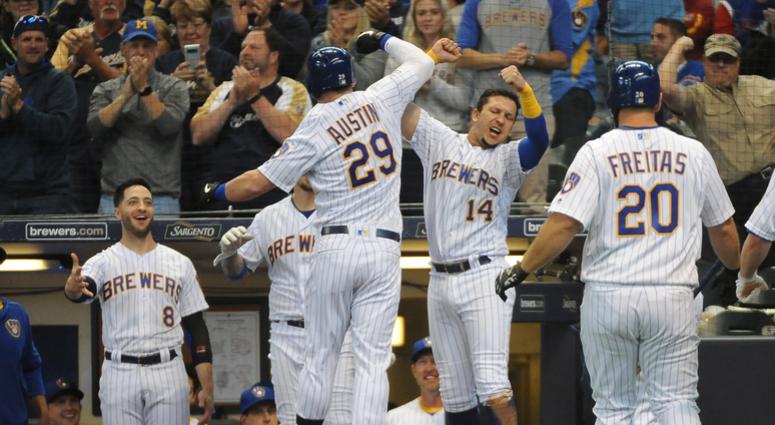 Brewers first baseman Tyler Austin (29) celebrates with third baseman Hernan Perez (14) after hitting a three-run homer against the Cubs. Brewers first baseman Tyler Austin (29) celebrates with third baseman Hernan Perez (14) after hitting a three-run homer against the Cubs.