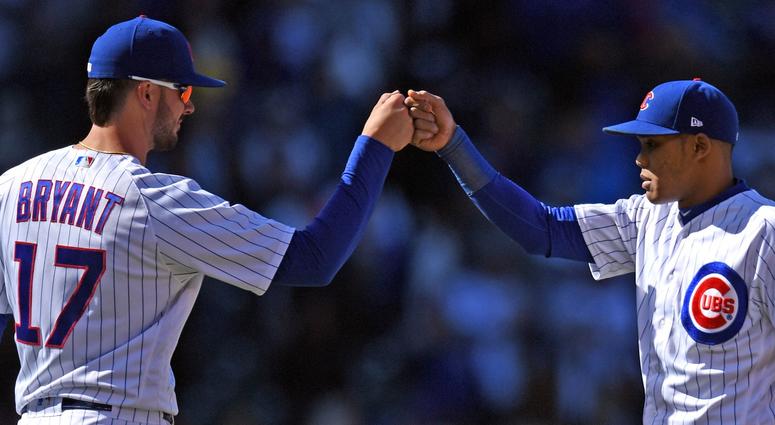 Cubs third baseman Kris Bryant, left, and shortstop Addison Rusell Cubs third baseman Kris Bryant, left, and shortstop Addison Rusell