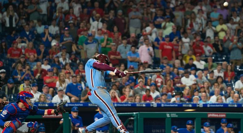 Phillies outfielder Bryce Harper hits a walk-off grand slam against the Cubs. Phillies outfielder Bryce Harper hits a walk-off grand slam against the Cubs.