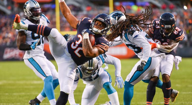 Bears running back David Montgomery (32) scores a touchdown against the Panthers. Bears running back David Montgomery (32) scores a touchdown against the Panthers.