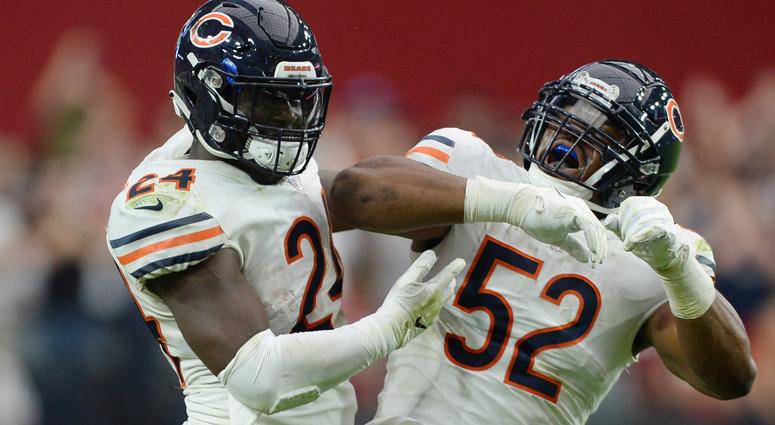 Bears running back Jordan Howard (24) and linebacker Khalil Mack (52) celebrate. Bears running back Jordan Howard (24) and linebacker Khalil Mack (52) celebrate.