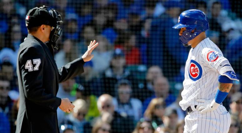 Cubs shortstop Javier Baez (9) talks with home plate umpire Gabe Morales after being called out on strikes. Cubs shortstop Javier Baez (9) talks with home plate umpire Gabe Morales after being called out on strikes.