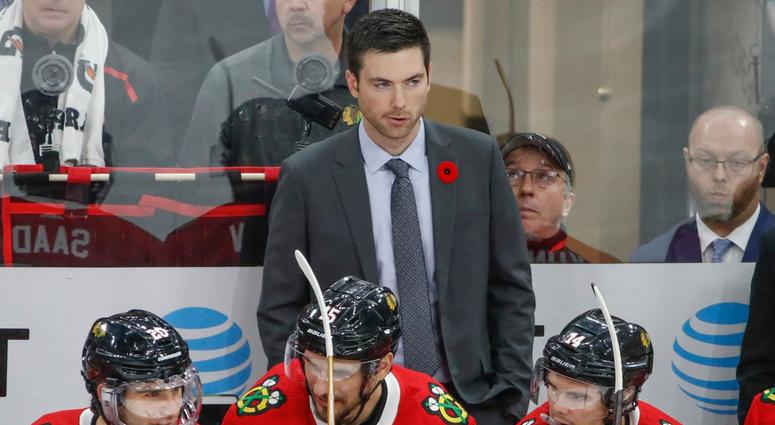 Blackhawks coach Jeremy Colliton looks on before a game against the Hurricanes. Blackhawks coach Jeremy Colliton looks on before a game against the Hurricanes.