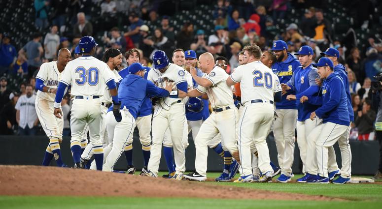 The Mariners celebrate a walk-off win against the White Sox. The Mariners celebrate a walk-off win against the White Sox.