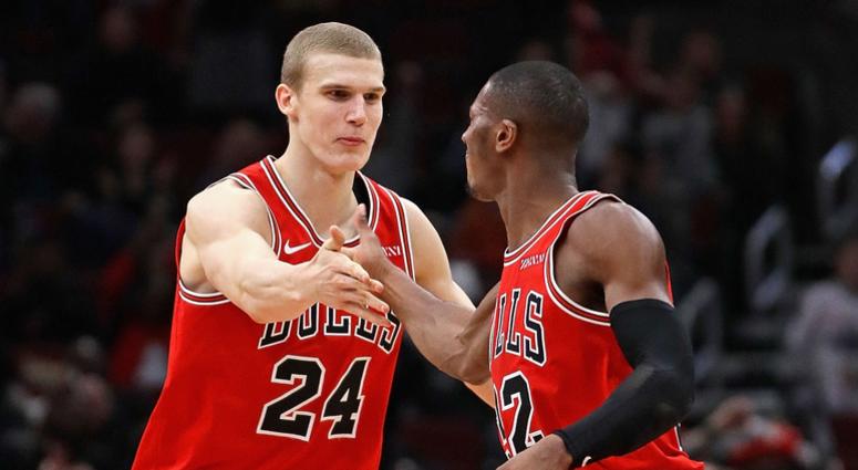 Bulls big man Lauri Markkanen, left, and point guard Kris Dunn celebrate. Bulls big man Lauri Markkanen, left, and point guard Kris Dunn celebrate.