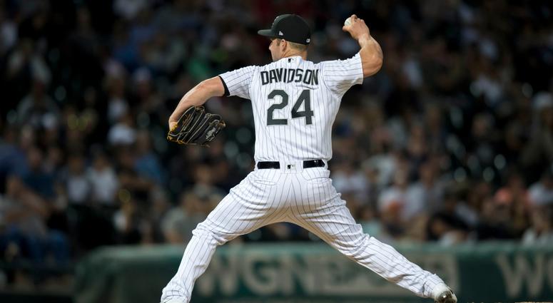 White Sox infielder Matt Davidson pitches. White Sox infielder Matt Davidson pitches.