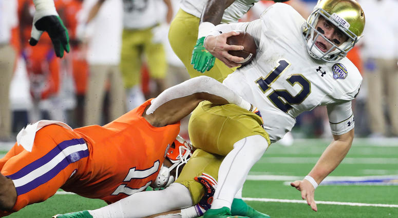 Notre Dame quarterback Ian Book (12) Notre Dame quarterback Ian Book (12)