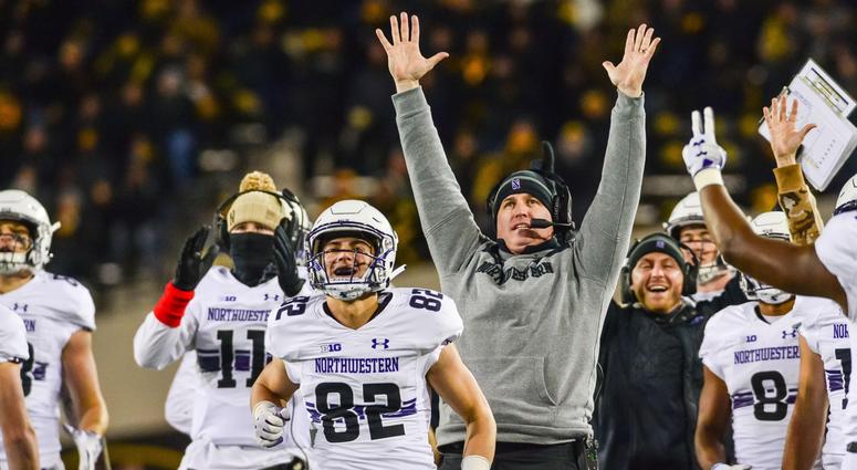 Northwestern coach Pat Fitzgerald and the Wildcats bench react after scoring a touchdown. Northwestern coach Pat Fitzgerald and the Wildcats bench react after scoring a touchdown.