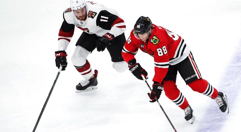 Blackhawks right wing Patrick Kane (88) skates with the puck. Blackhawks right wing Patrick Kane (88) skates with the puck.