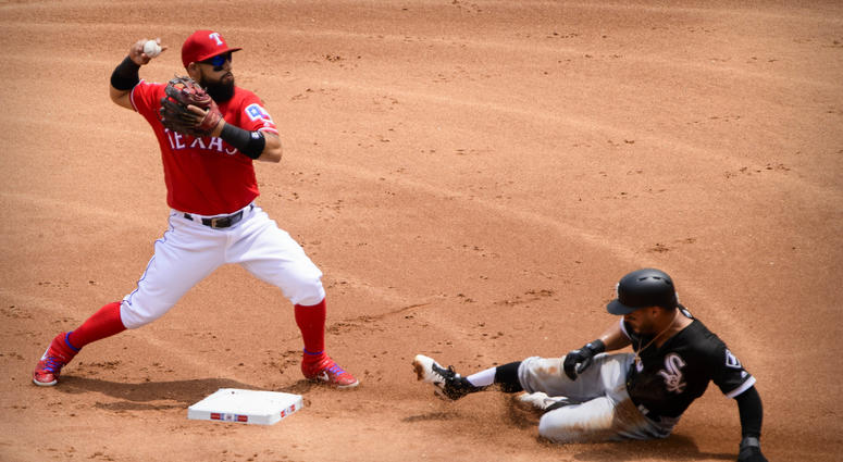 Rangers second baseman Rougned Odor (12) forces out White Sox second baseman Leury Garcia (28) and turns a double play. Rangers second baseman Rougned Odor (12) forces out White Sox second baseman Leury Garcia (28) and turns a double play.