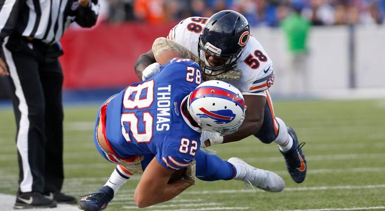 Bears linebacker Roquan Smith (58) tackles Bills tight end Logan Thomas. Bears linebacker Roquan Smith (58) tackles Bills tight end Logan Thomas.