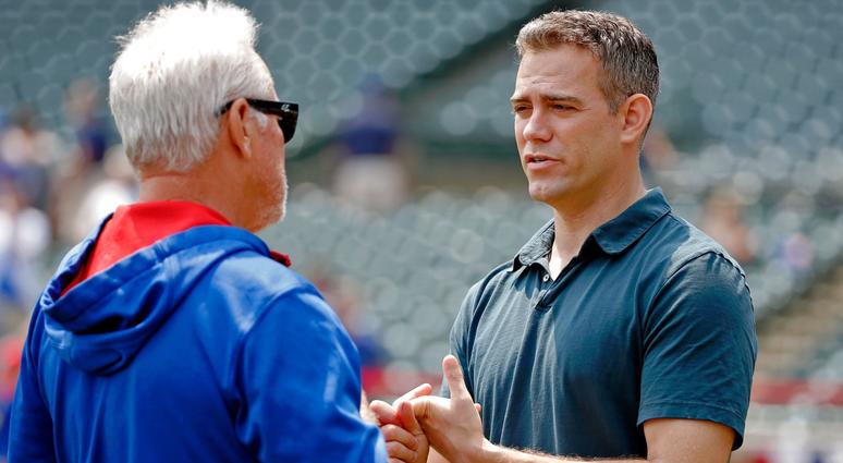 Cubs manager Joe Maddon, left, and president of baseball operations Theo Epstein have a conversation in 2015. Cubs manager Joe Maddon, left, and president of baseball operations Theo Epstein have a conversation in 2015.